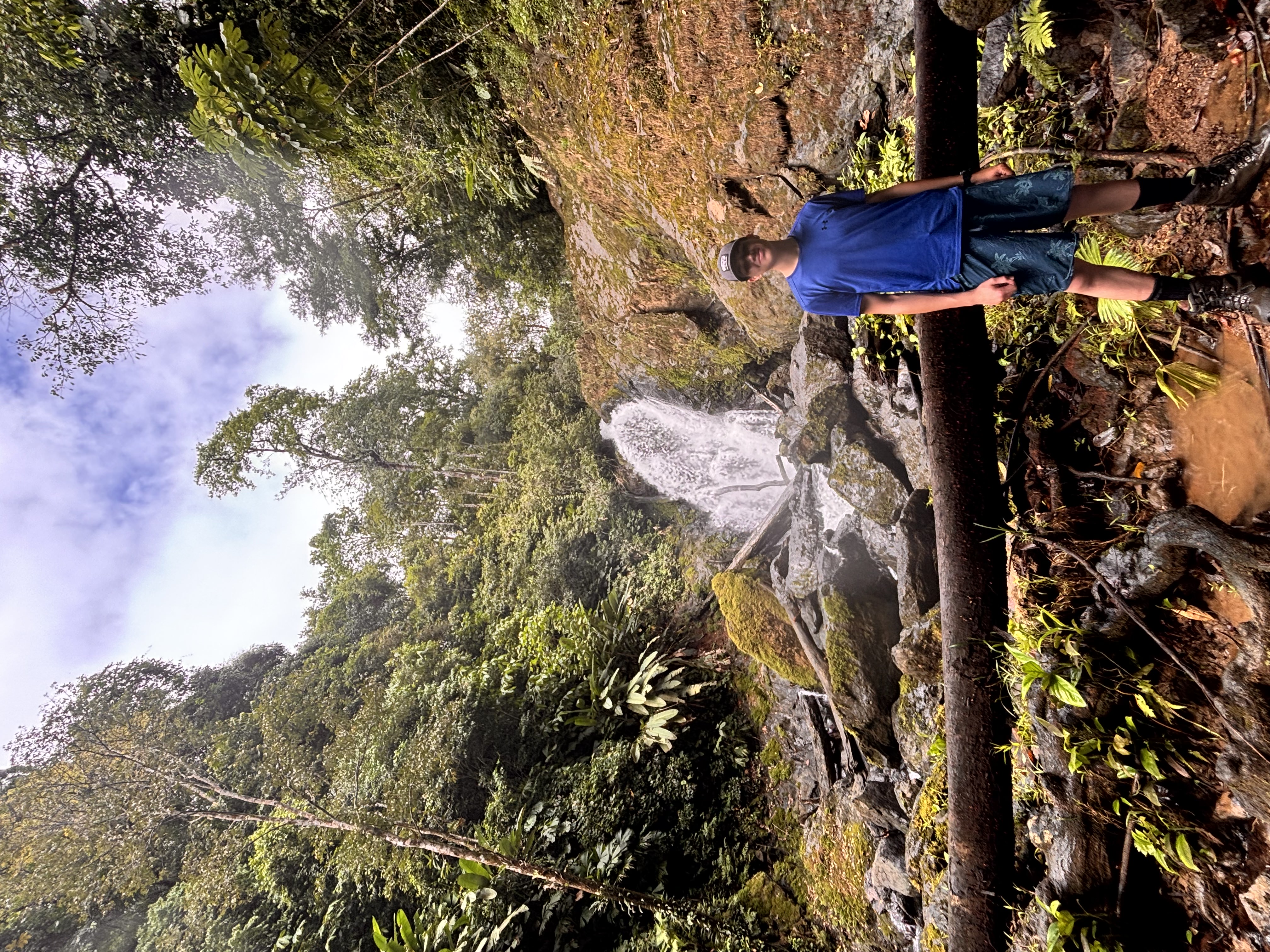 In front of a waterfall in Corcovado National Park, Costa Rica